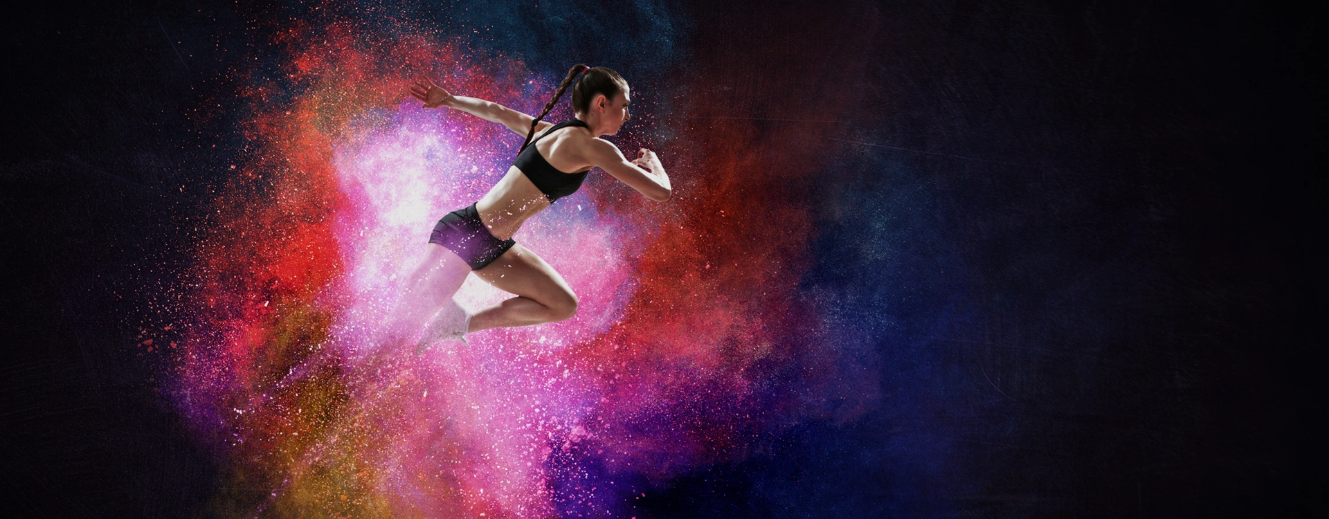 Woman running, illustrated with an explosion of colors